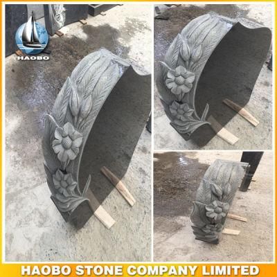 Black Granite Headstone with Carved Flowers
