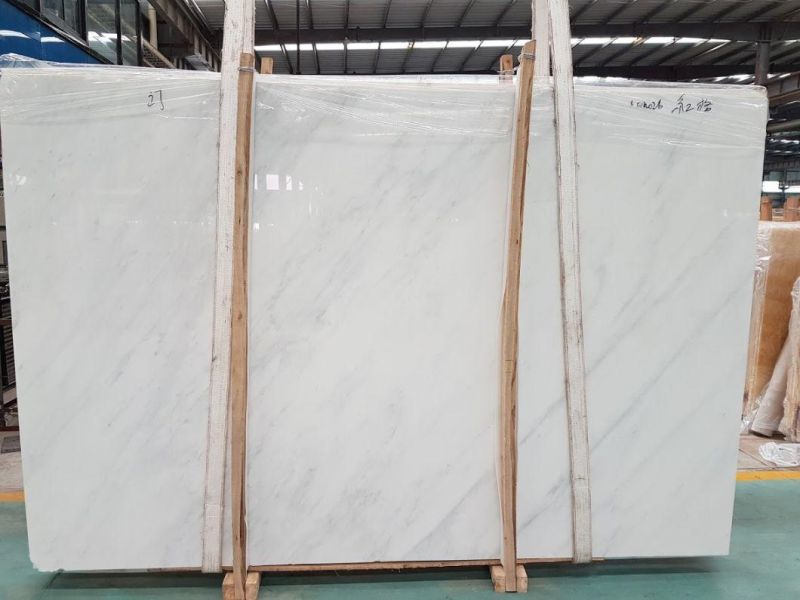 Natural Stone Chinese Polished Oriental White Marble for Tile and Slab/Flooring and Wall Tiles/Wall Cladding/Window Sill and Counter Top/Bathroom Tile Marble