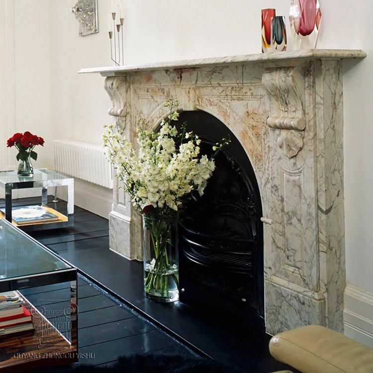 White Marble Fireplace Mantel with Floral Pattern